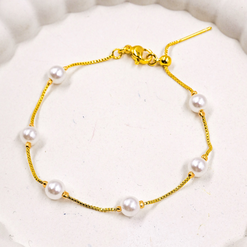 manilla con perlas...