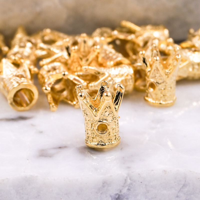 dije corona dorada x unid