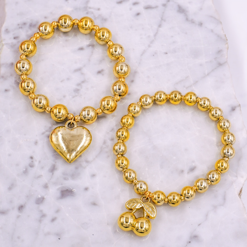 pulsera balines dorados con...