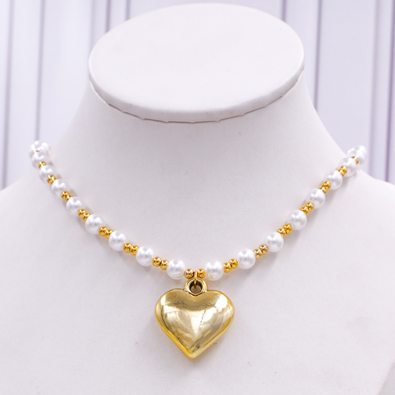 collar de perlas y balin...