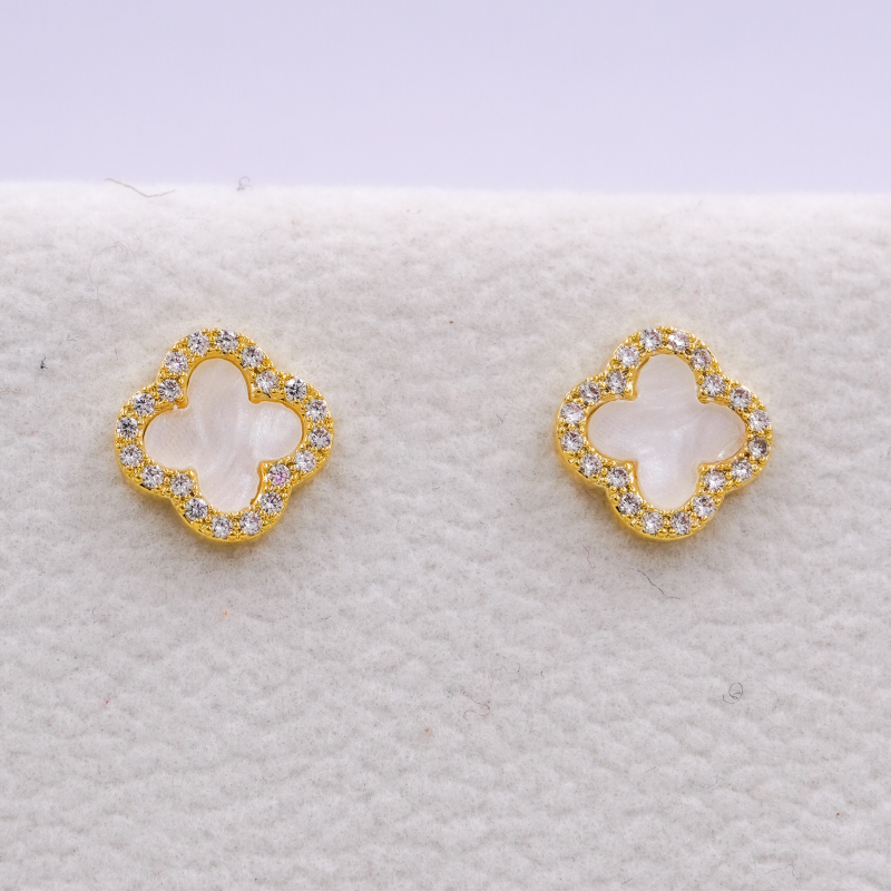 arete topo trebol blanco...