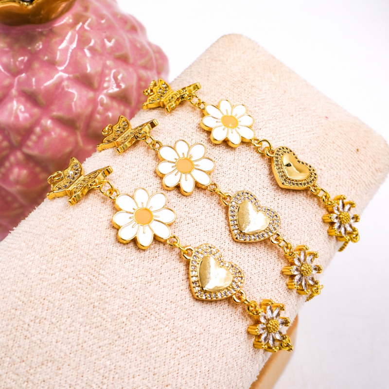 pulsera con dijes de rodio