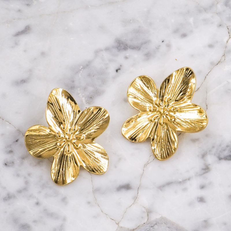 arete de acero dorado flor...