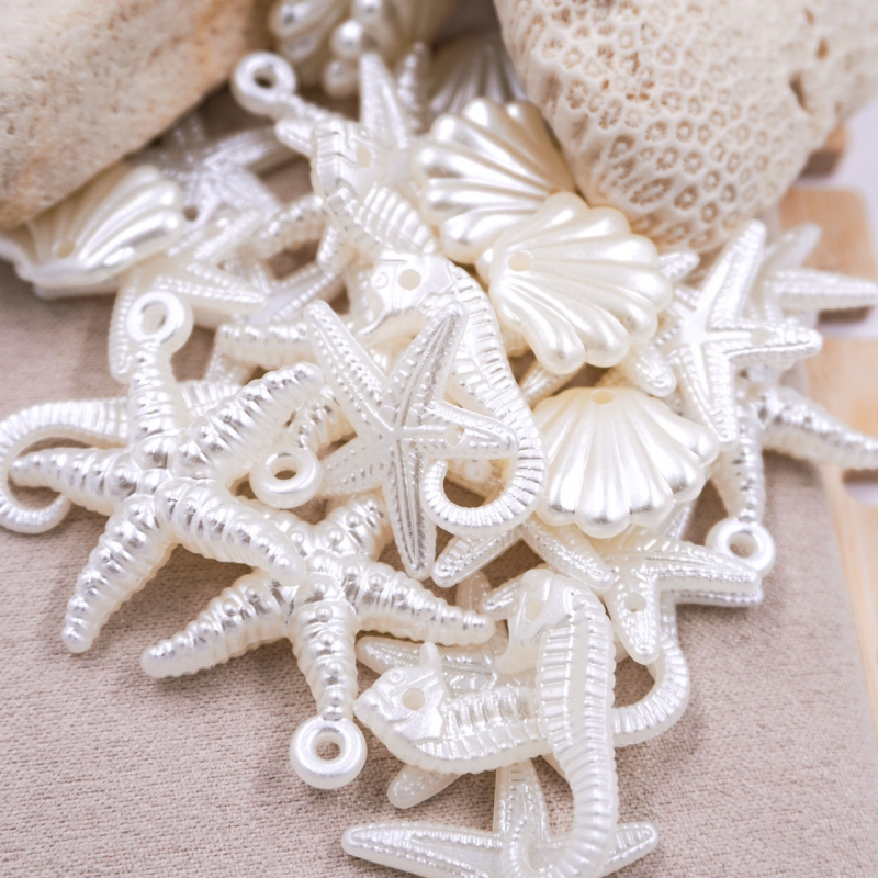 Paquete dijes de mar blanco...