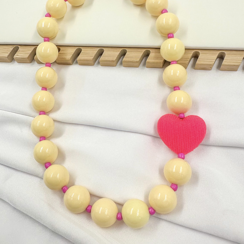 collar bola chiche amarillo...