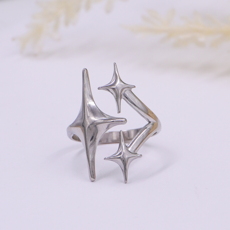 anillo plateado estrellas x...