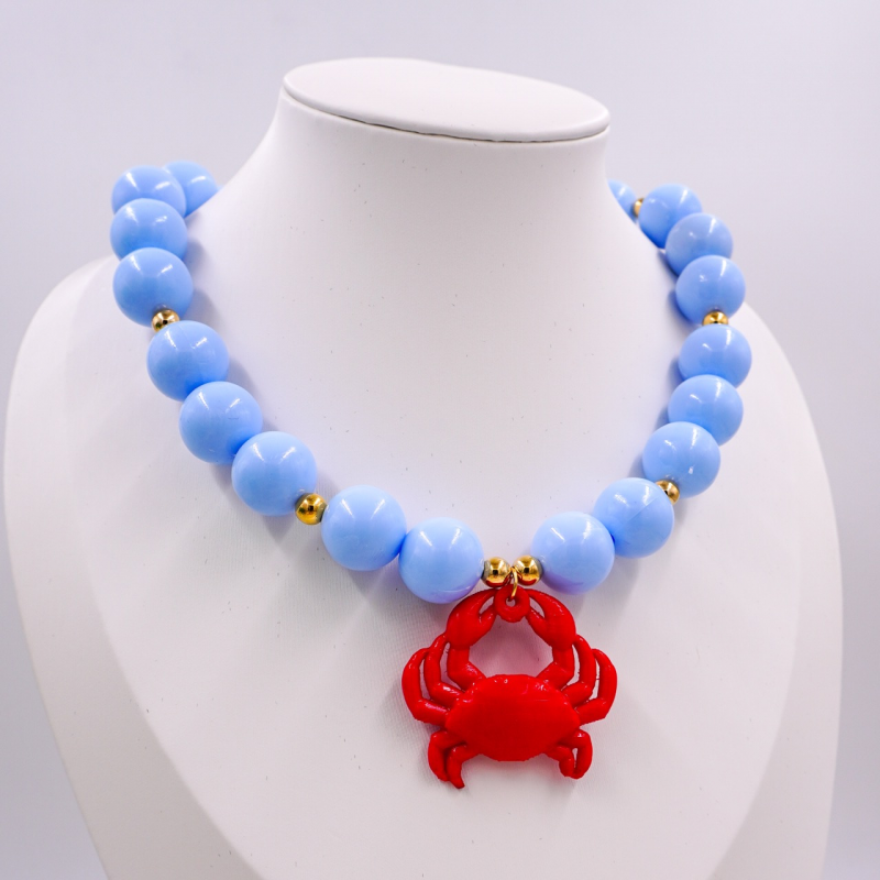 collar bola chicle azul con...