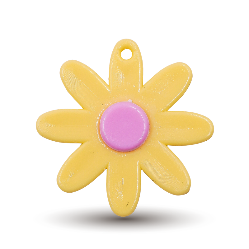 Dije flor amarilla x unidad