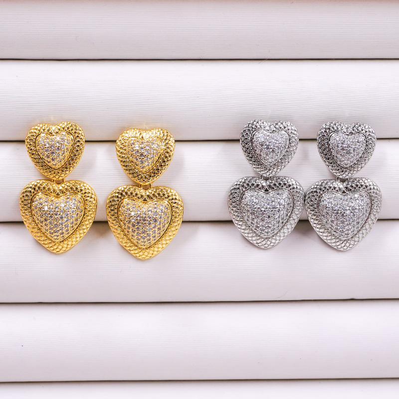 Aretes corazón doble...