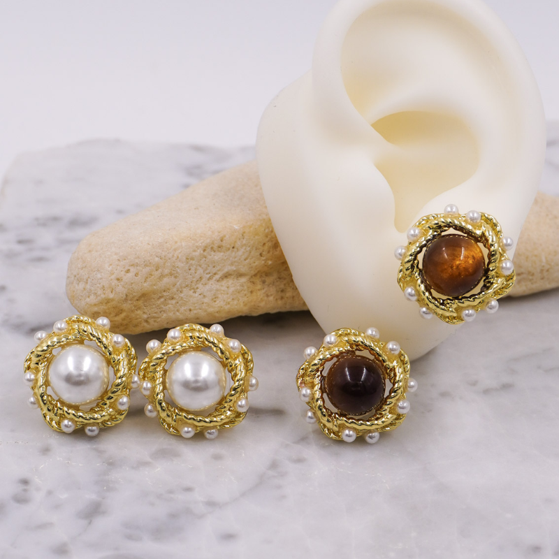 Aretes circulos con perlas...