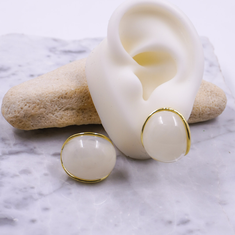 Aretes circulos blancos en...