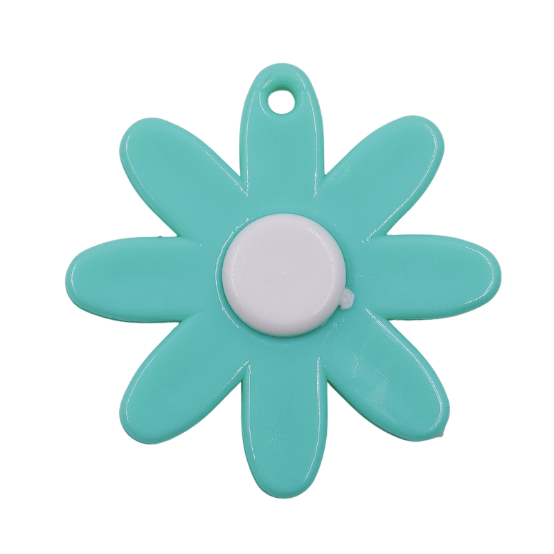 Dije flor turquesa x unidad