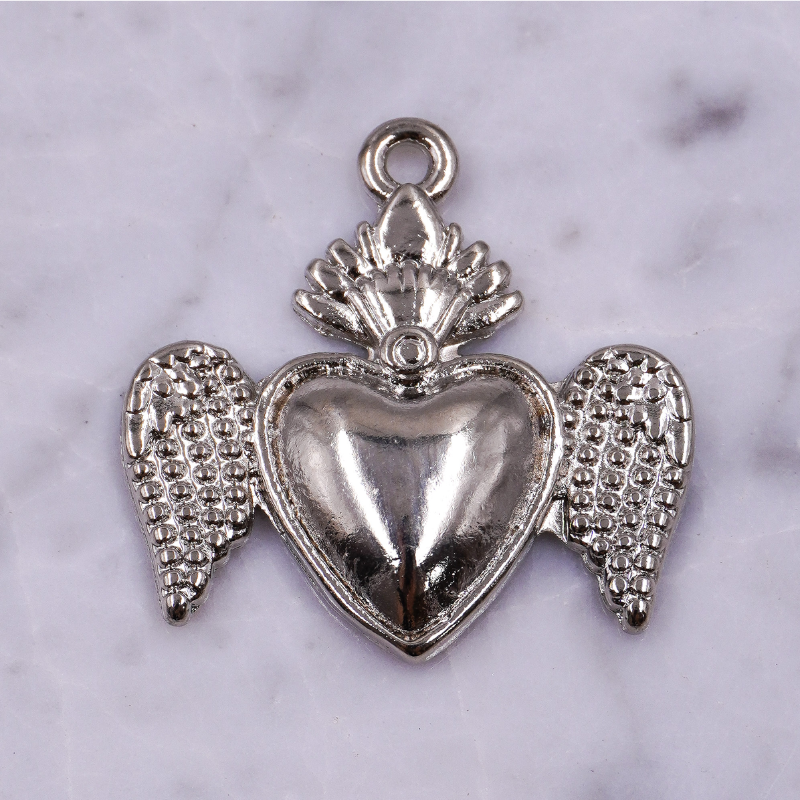 Dije de sagrado corazón de...