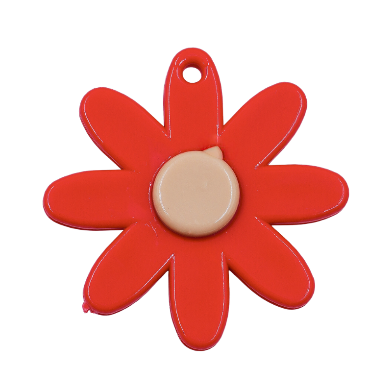 Dije flor roja con punto...