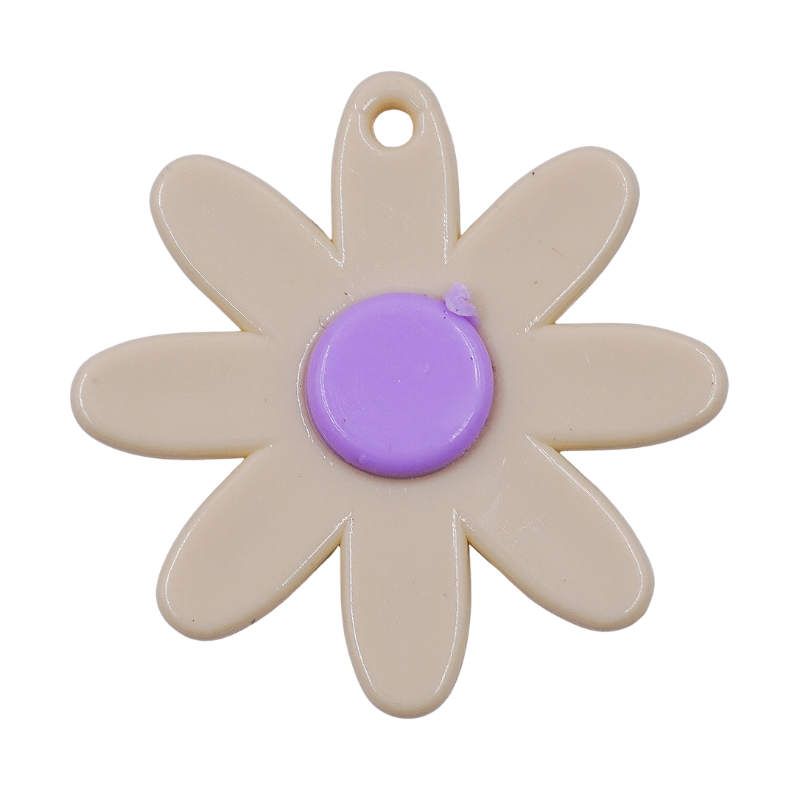 Dije flor beige con punto...