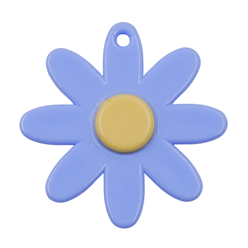 Dije de flor azul claro con...
