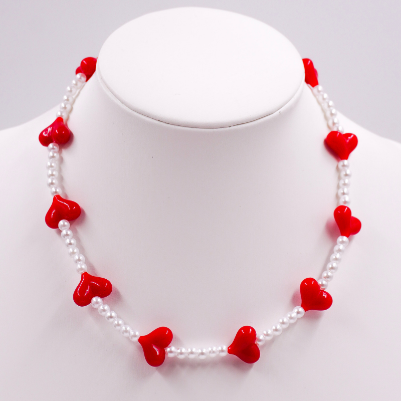 Collar de perlas y...