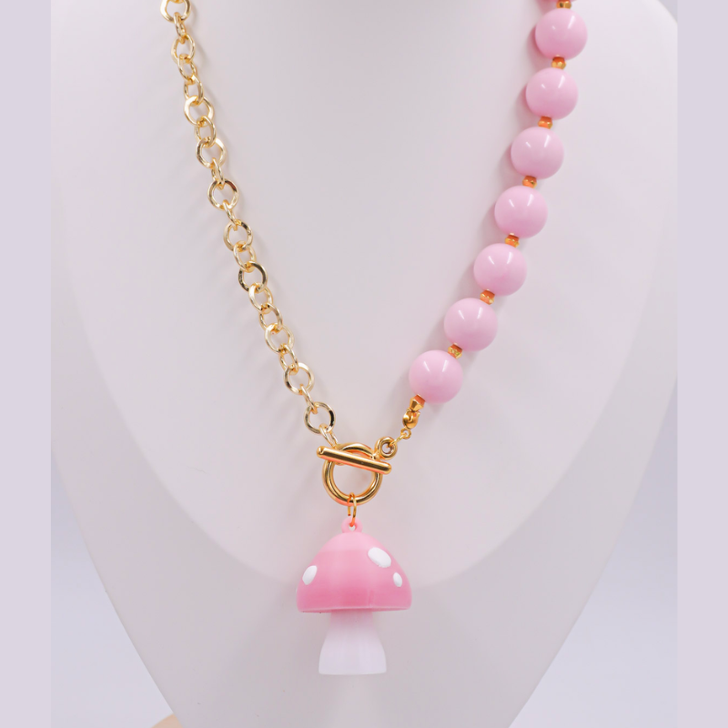 collar bola chicle rosado y...