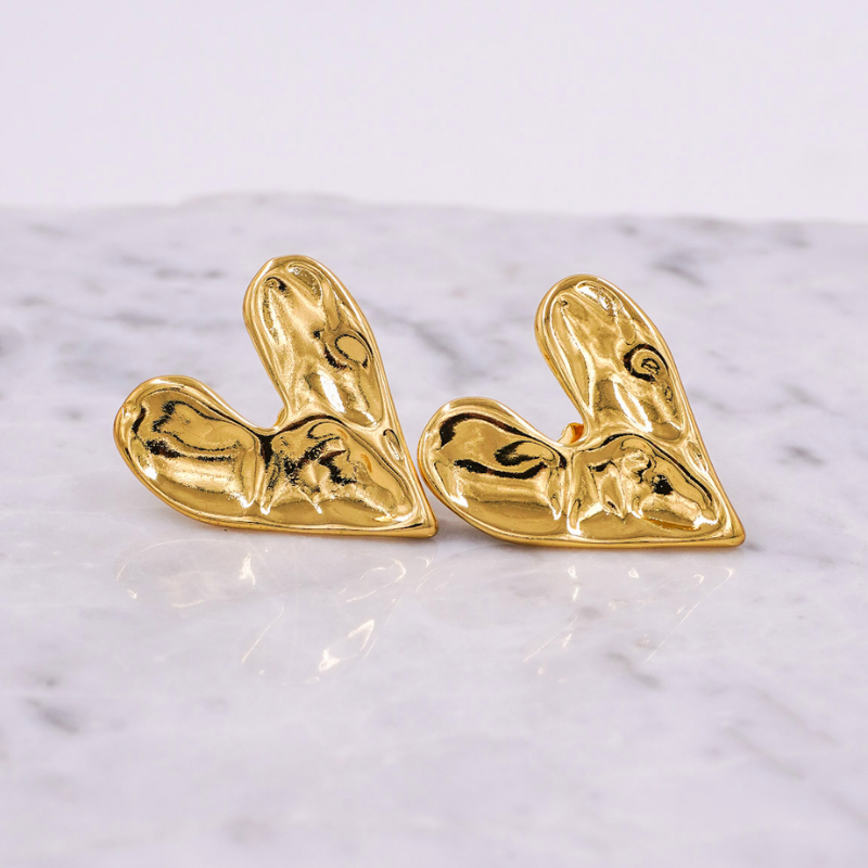 Aretes topos de corazon con...