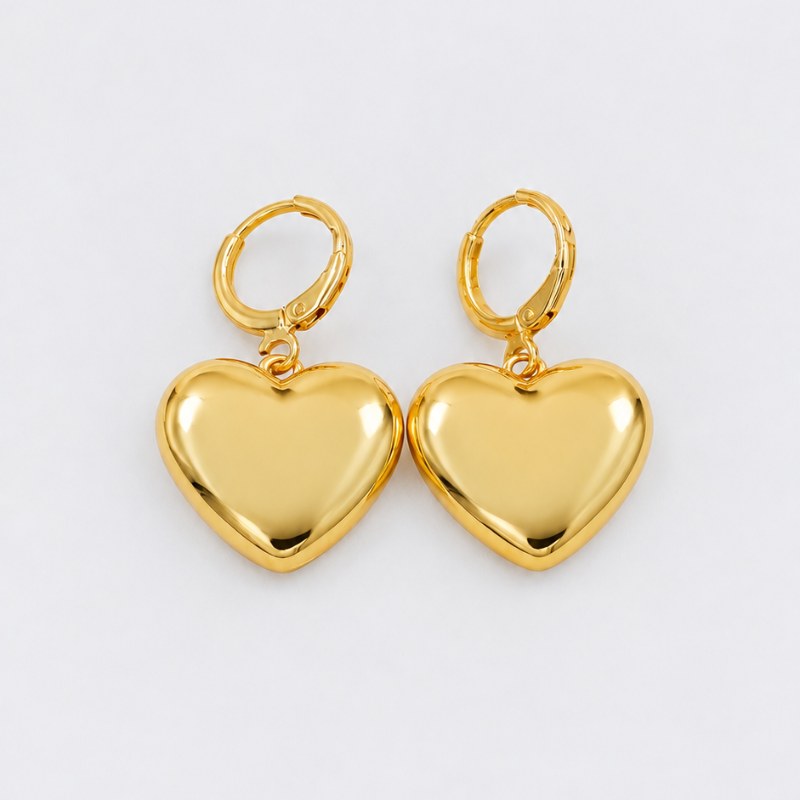 Arete corazon liso en rodio...