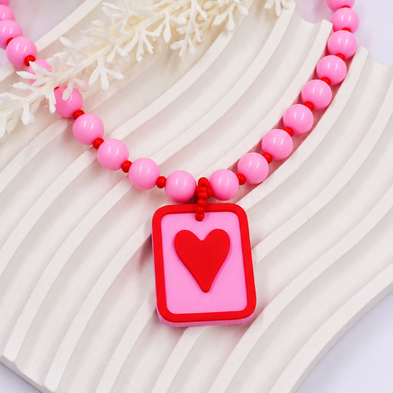 Collar bola chicle rosado...