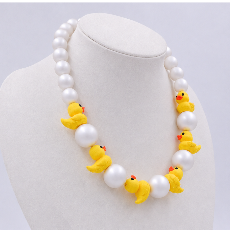 Collar perlas con patos