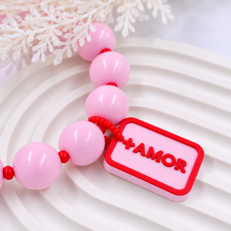 Collar bola chicle placa amor